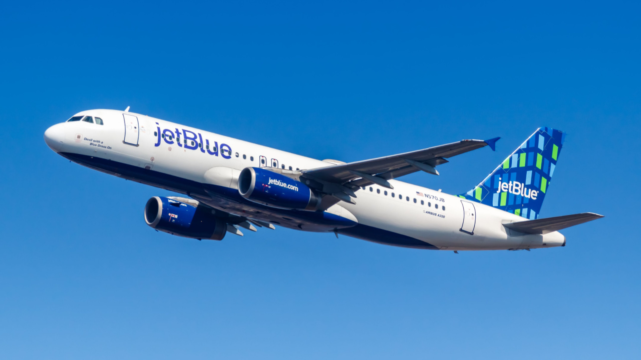 JetBlue plane in the air.